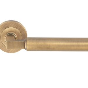 Amiata Door Handles On Round Rose, Antique Brass (sold in pairs)