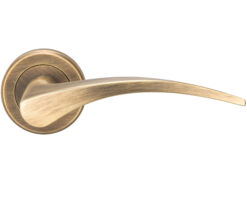 Serozzetta Olivier Door Handles On Round Rose - Antique Brass (sold in pairs)