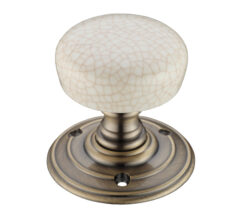 Ivory Crackle Glaze Porcelain Door Knobs, Florentine Bronze  (sold in pairs)