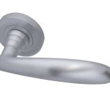 Reguitti Arc Door Handles On Round Rose.