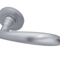 Reguitti Arc Door Handles On Round Rose.