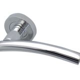 Curve Door Handles On Round Rose, Polished Chrome  (sold in pairs)