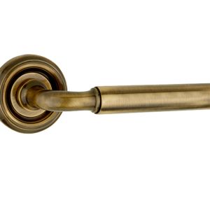 Parisian Elise Door Handles On Round Rose, Antique Brass  (sold in pairs)