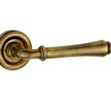 Parisian Camille Door Handles On Round Rose, Antique Brass  (sold in pairs)