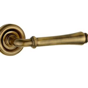 Parisian Camille Door Handles On Round Rose, Antique Brass  (sold in pairs)