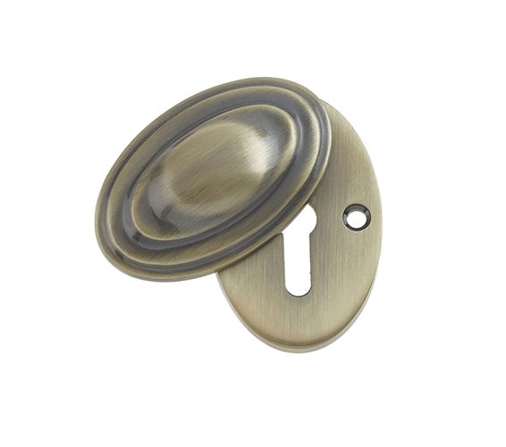 Standard Profile Covered Escutcheon (56mm x 32mm), Antique Brass
