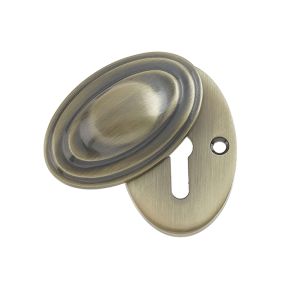 Standard Profile Covered Escutcheon (56mm x 32mm), Antique Brass