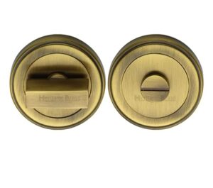 Heritage Brass Art Deco Style Round 53mm Diameter Turn & Release, Antique Brass Finish -