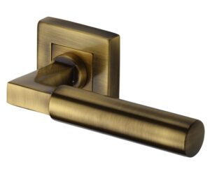 Heritage Brass Bauhaus SQ Antique Brass Door Handles On Square Rose (sold in pairs)