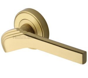 Heritage Brass Tiffany Art Deco Style Door Handles On Round Rose, Satin Brass  (sold in pairs)