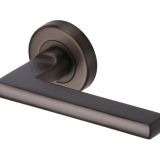 Heritage Brass Trident Matt Bronze Door Handles On Round Rose (sold in pairs)