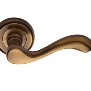 Heritage Brass Lisboa Antique Brass Door Handles On Round Rose  (sold in pairs)