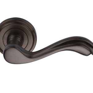 Heritage Brass Lisboa Matt Bronze Door Handles On Round Rose (sold in pairs)
