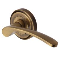 Heritage Brass Sophia Antique Brass Door Handles On Round Rose (sold in pairs)