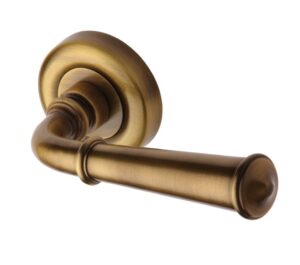 Heritage Brass Colonial Antique Brass Door Handles On Round Rose  (sold in pairs)