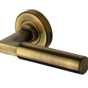 Heritage Brass Bauhaus Antique Brass Door Handles On Round Rose(sold in pairs)