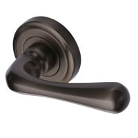 Heritage Brass Charlbury Matt Bronze Door Handles On Round Rose (sold in pairs)