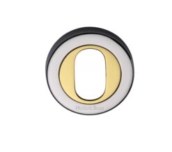 Heritage Brass Oval Profile Key Escutcheon Dual Finish, Polished Chrome With Polished Brass -