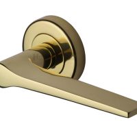 Heritage Brass Gio Polished Brass Door Handles On Round Rose –  (sold in pairs)