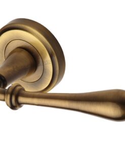 Heritage Brass Roma Antique Brass Door Handles On Round Rose