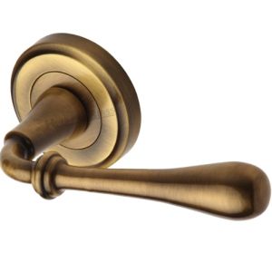 Heritage Brass Roma Antique Brass Door Handles On Round Rose   (sold in pairs)
