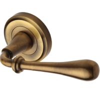Heritage Brass Roma Antique Brass Door Handles On Round Rose  (sold in pairs)