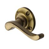 Heritage Brass Bedford Antique Brass Door Handles On Round Rose   (sold in pairs)