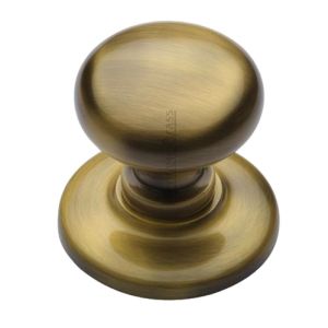 Heritage Brass Round Centre Door Knob, Antique Brass